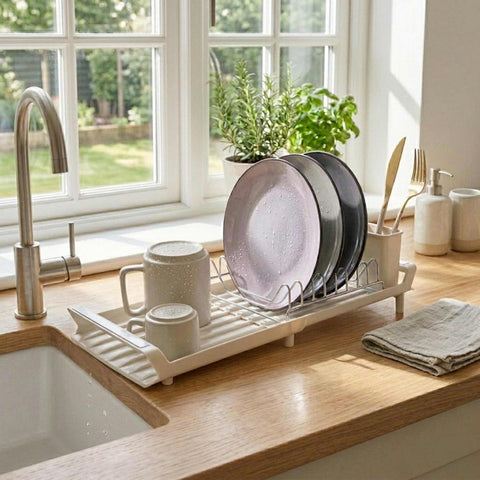 Product image of Adjustable dish rack. Part of the Sahara Collection . Features: • Material: stainless steel, plastic, iron • Size: 27,9-46,5*20*11,6 cm • Adjustable tray • Color: cream. (Studio view). Official Berlinger Haus product, boosted by Promintra sl.