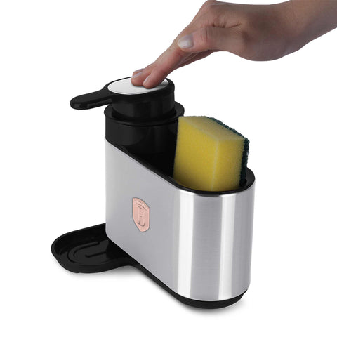 Product image of Soap dispenser. Part of the Black Rose Collection . Features: • Material: stainless steel, plastic • Size: 15,8*12,7*17,8 cm • Color: black- rose gold. (Studio view). Official Berlinger Haus product, boosted by Promintra sl.