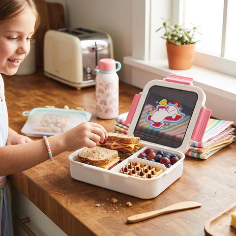 Product image of Lunch box. Part of the Minions Collection . Features: • Material: plastic, silicone • Capacity: • 24*18 cm, 1320 ml • Color: pink- white. (Studio view). Official Berlinger Haus product, boosted by Promintra sl.