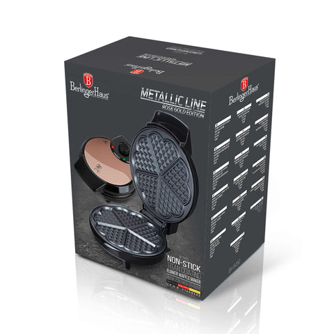 Product image of Waffle maker flower shape. Part of the Metallic Line Rose Gold Edition . Features: • Power: 700W • Voltage: 220-240 V, 50/60Hz • Plate size: 20,32 cm • NON-STICK TITAN black coating on plate • Color: rose gold. (Studio view). Official Berlinger Haus product, boosted by Promintra sl.