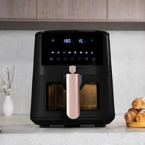 Product image of Air fryer 5L visible window. Part of the Black Rose Collection . Features: • Power: 220-240V ~ 1400W • Temperature control: 40-200℃ • Include: • XL SIZE: food basket with non-stick coating 5L • DIGITAL • Color: black- rose.... (Studio view). Official Berlinger Haus product, boosted by Promintra sl.