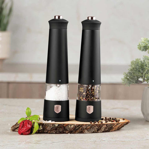 Product image of Electric pepper and salt mill 2pcs set. Part of the Black Rose Collection . Features: • Material: plastic with CERAMIC grinder • Batteries: 4 pcs AAA (not inc.) • WITH LIGHT • Color: black- rose gold • 2 pcs set. (Studio view). Official Berlinger Haus product, boosted by Promintra sl.