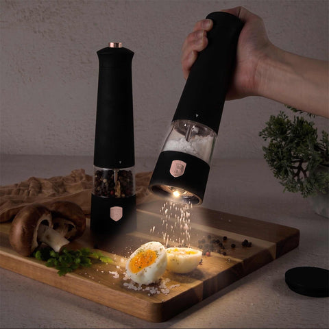 Product image of Electric pepper and salt mill 2pcs set. Part of the Black Rose Collection . Features: • Material: plastic with CERAMIC grinder • Batteries: 4 pcs AAA (not inc.) • WITH LIGHT • Color: black- rose gold • 2 pcs set. (Studio view). Official Berlinger Haus product, boosted by Promintra sl.