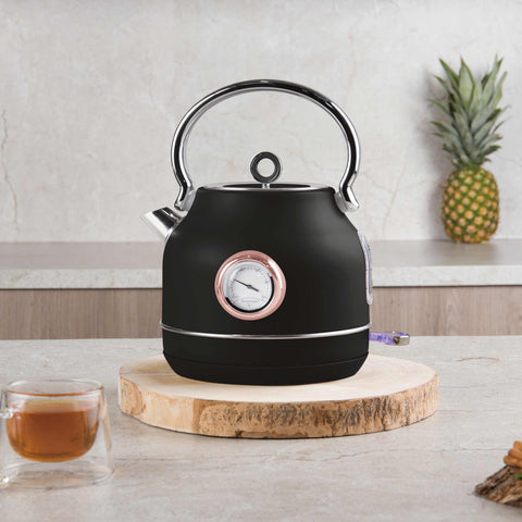 Product image of Electric kettle with thermometer. Part of the Black Rose Collection . Features: • Material: 18/10 stainless steel • Capacity: 1,7L • Voltage: 220-240V,50/60Hz • Power: 2200W • Size: 26*20*28 cm • Length of power cord: 75 cm • C.... (Studio view). Official Berlinger Haus product, boosted by Promintra sl.