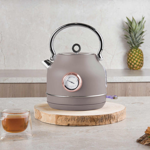 Product image of Electric kettle with thermometer. Part of the Taupe Collection . Features: • Material: 18/10 stainless steel • Capacity: 1,7L • Voltage: 220-240V,50/60Hz • Power: 2200W • Size: 26*20*28 cm • Length of power cord: 75 cm • C.... (Studio view). Official Berlinger Haus product, boosted by Promintra sl.