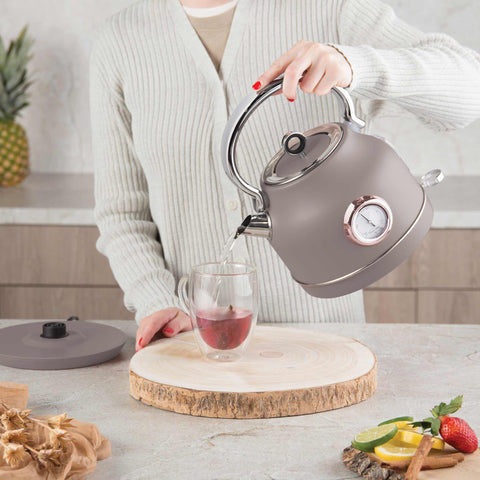 Product image of Electric kettle with thermometer. Part of the Taupe Collection . Features: • Material: 18/10 stainless steel • Capacity: 1,7L • Voltage: 220-240V,50/60Hz • Power: 2200W • Size: 26*20*28 cm • Length of power cord: 75 cm • C.... (Studio view). Official Berlinger Haus product, boosted by Promintra sl.