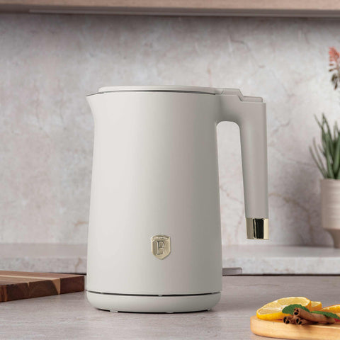 Product image of Double wall kettle. Part of the Sahara Collection . Features: • Material: 18/10 stainless steel inside, plastic outside • Capacity: 1,7L • Voltage: 220-240V,50/60Hz • Power: 1800 W • Color: matt cream. (Studio view). Official Berlinger Haus product, boosted by Promintra sl.