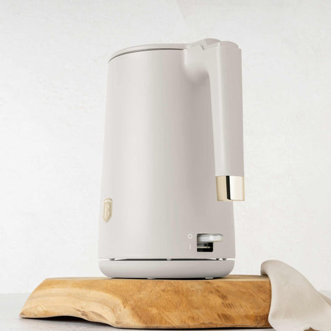 Product image of Double wall kettle. Part of the Sahara Collection . Features: • Material: 18/10 stainless steel inside, plastic outside • Capacity: 1,7L • Voltage: 220-240V,50/60Hz • Power: 1800 W • Color: matt cream. (Studio view). Official Berlinger Haus product, boosted by Promintra sl.