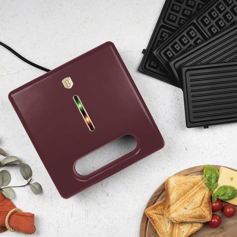 Product image of 3in1 sandwich maker with detachable plates. Part of the Leonardo Collection . Features: • Material: aluminium, bakelite • Power: 780 W • Voltage: 220-240 V, 50/60Hz • Plate size: 22,5*13 cm • NON-STICK coating • Color: matt bordeaux. (Studio view). Official Berlinger Haus product, boosted by Promintra sl.