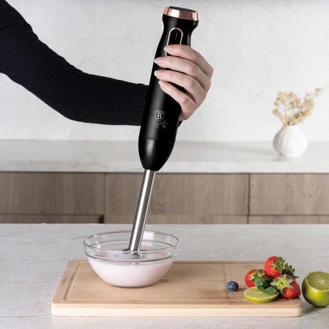 Product image of Hand blender. Part of the Black Rose Collection . Features: • Material: stainless steel, plastic • Voltage: 220-240V 50-60Hz • Power: 800W • Color: black- rose gold. (Studio view). Official Berlinger Haus product, boosted by Promintra sl.