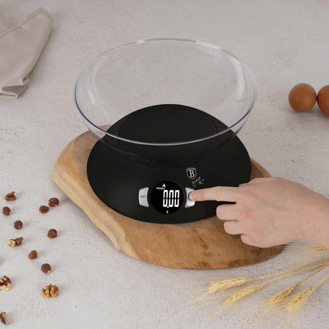 Product image of Kitchen scale with bowl. Part of the Black Vantage Collection/Matte Black Collection/Black Silver Collection . Features: • Material: plastic • LCD display • Capacity: 5 kg • AAA battery included • Color: matt black. (Conceptual view). Official Berlinger Haus product, boosted by Promintra sl.