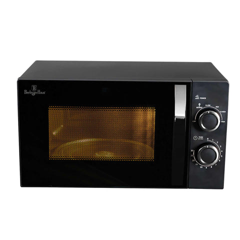Product image of Mechanical microwave oven 20L. Part of the Black Vantage Collection/Matte Black Collection/Black Silver Collection . Features: • Input power: 1200W/ 2450 MHz • Output power: 700W • Capacity: 20L • Glass plate: Ø24,5 cm • Size: 26,2*45,2*33,5 cm • Color: black- silver. (Studio view). Official Berlinger Haus product, boosted by Promintra sl.