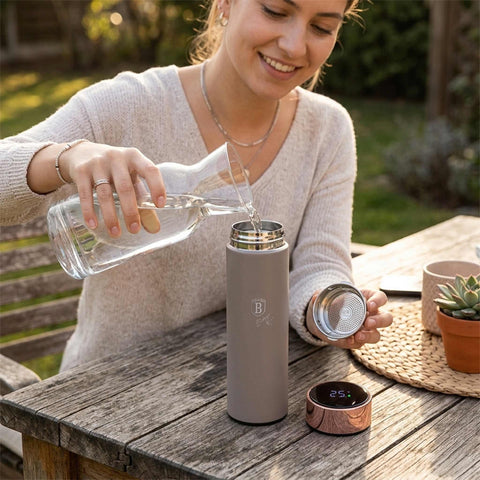 Product image of Drinking bottle with LED temperature display 0,5L. Part of the Taupe Collection . Features: • Material: inner body 18/10 stainless steel with matt powder coating • Capacity: 0,5 L • 18/10 stainless steel purifying filter • Color: matt taup.... (Studio view). Official Berlinger Haus product, boosted by Promintra sl.