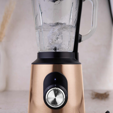 Product image of Table blender with 1,5L GLASS jar 1000W. Part of the Metallic Line Rose Gold Edition . Features: • Material: stainless steel, glass, plastic • Power: 1000 W • Voltage: 220-240V, 50-60 Hz • 1,5 L glass jar with double safety lock system (both on.... (Studio view). Official Berlinger Haus product, boosted by Promintra sl.