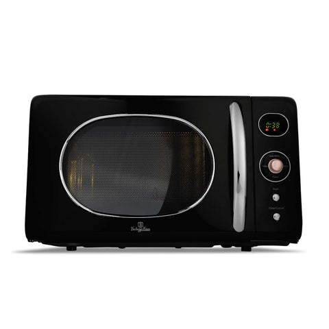 Product image of Digital microwave oven 20L. Part of the Black Rose Collection . Features: • Input power: 1200W/ 2450 MHz • Output power: 800W • Capacity: 20L • Glass plate: Ø24,5 cm • Size: 26,2*45,2*38,6 cm • Color: black- rose gold. (Studio view). Official Berlinger Haus product, boosted by Promintra sl.