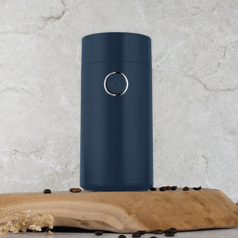 Product image of Electric coffee grinder. Part of the Deep Sea Collection . Features: • Power: 150 W • 220V-240V 50/60 Hz • Stainless steel bowl • Stainless steel blades • Color: mat blue. (Studio view). Official Berlinger Haus product, boosted by Promintra sl.