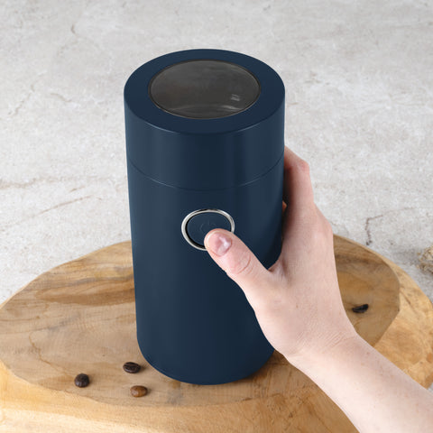 Product image of Electric coffee grinder. Part of the Deep Sea Collection . Features: • Power: 150 W • 220V-240V 50/60 Hz • Stainless steel bowl • Stainless steel blades • Color: mat blue. (Studio view). Official Berlinger Haus product, boosted by Promintra sl.