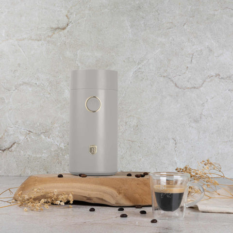 Product image of Electric coffee grinder. Part of the Sahara Collection . Features: • Power: 150 W • 220V-240V 50/60 Hz • Stainless steel bowl • Stainless steel blades • Color: cream. (Studio view). Official Berlinger Haus product, boosted by Promintra sl.
