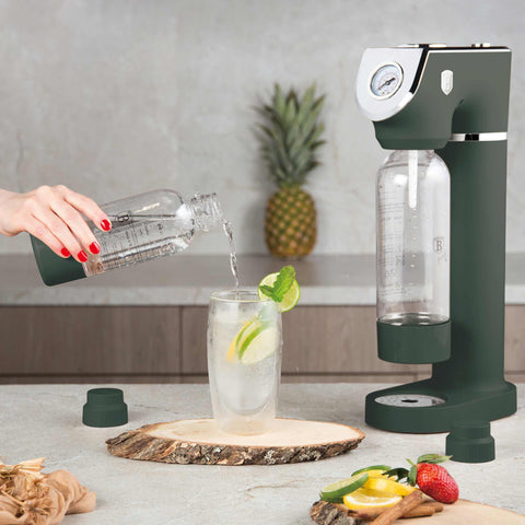 Product image of Soda maker with 2bottles and barometer universal CO2cylinders size. Part of the Matte Green Collection . Features: • Material: stainless steel, pp • Size: 43,5*22*12 cm • 2 pcs pp bottle with cup: 1,0L and 0,5L • Universal, standard CO2 cylinders size (not inclu.... (Studio view). Official Berlinger Haus product, boosted by Promintra sl.