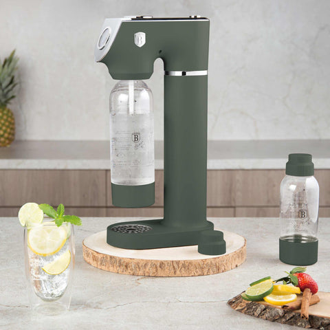 Product image of Soda maker with 2bottles and barometer universal CO2cylinders size. Part of the Matte Green Collection . Features: • Material: stainless steel, pp • Size: 43,5*22*12 cm • 2 pcs pp bottle with cup: 1,0L and 0,5L • Universal, standard CO2 cylinders size (not inclu.... (Studio view). Official Berlinger Haus product, boosted by Promintra sl.