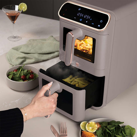 Product image of Dual basket air fryer 5,5+5,5L with visible windows. Part of the Taupe Collection . Features: • Power: 220-240V ~ 50-60Hz 2460W • Temperature control: 60-200℃ • XXXL SIZE: Capacity: 11L=5,5L+5,5L • Non-stick oil tray and food basket - dishwa.... (Studio view). Official Berlinger Haus product, boosted by Promintra sl.