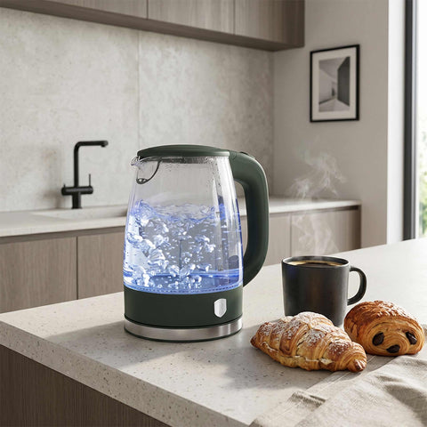 Product image of Electric glass kettle. Part of the Matte Green Collection . Features: • Material: stainless steel, borosilicate glass and plastic • Capacity: 1,7L • Voltage: 220-240V,50/60Hz • Power: 1850-2200W • Size: 22,3*16,1*24,2.... (Studio view). Official Berlinger Haus product, boosted by Promintra sl.