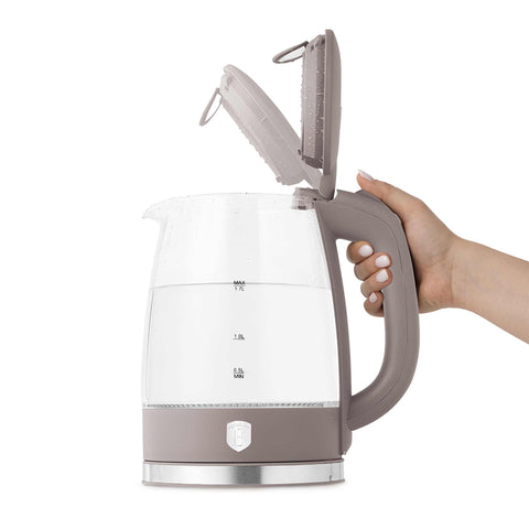 Product image of Electric glass kettle. Part of the Taupe Collection . Features: • Material: stainless steel, borosilicate glass and plastic • Capacity: 1,7L • Voltage: 220-240V,50/60Hz • Power: 1850-2200W • Size: 22,3*16,1*24,2.... (Studio view). Official Berlinger Haus product, boosted by Promintra sl.