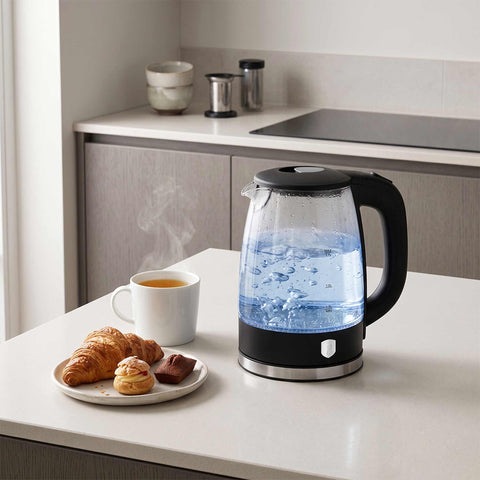 Product image of Electric glass kettle. Part of the Black Vantage Collection/Matte Black Collection/Black Silver Collection . Features: • Material: stainless steel, borosilicate glass and plastic • Capacity: 1,7L • Voltage: 220-240V,50/60Hz • Power: 1850-2200W • Size: 22,3*16,1*24,2.... (Studio view). Official Berlinger Haus product, boosted by Promintra sl.