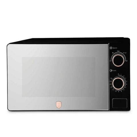 Product image of Mechanical microwave oven 20L. Part of the Black Rose Collection . Features: • Input power: 1100W • Output power: 700W • Capacity: 20L • Glass plate: Ø24,5 cm • Size: 24,2*44,5*32,5 cm • Length of power cord: 85 cm • Color: .... (Studio view). Official Berlinger Haus product, boosted by Promintra sl.