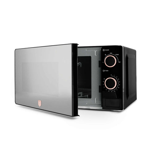Product image of Mechanical microwave oven 20L. Part of the Black Rose Collection . Features: • Input power: 1100W • Output power: 700W • Capacity: 20L • Glass plate: Ø24,5 cm • Size: 24,2*44,5*32,5 cm • Length of power cord: 85 cm • Color: .... (Studio view). Official Berlinger Haus product, boosted by Promintra sl.