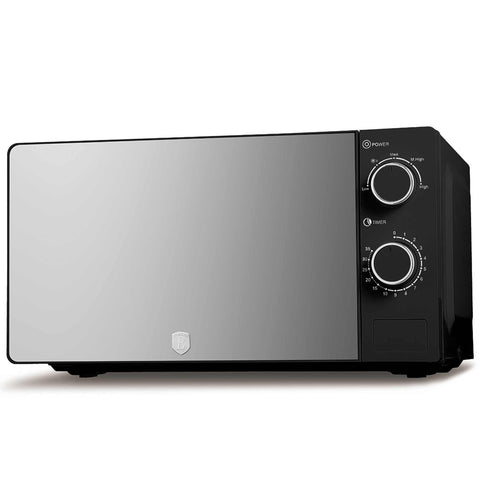 Product image of Mechanical microwave oven 20L. Part of the Black Vantage Collection/Matte Black Collection/Black Silver Collection . Features: • Input power: 1100W • Output power: 700W • Capacity: 20L • Glass plate: Ø24,5 cm • Size: 24,2*44,5*32,5 cm • Length of power cord: 85 cm • Color: .... (Studio view). Official Berlinger Haus product, boosted by Promintra sl.