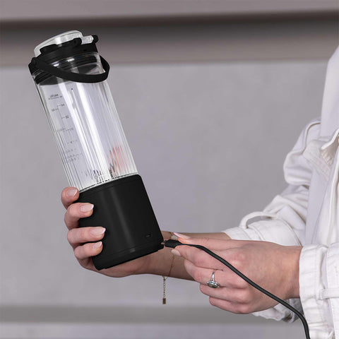 Product image of Cordless portable blender. Part of the Black Rose Collection . Features: • Material: stainless steel, plastic • Power: 110 W • Capacity: 400 ml • Rechargeable battery: 2000mAh, 7,4 V • Charging time: 3 hours • Accessorie.... (Studio view). Official Berlinger Haus product, boosted by Promintra sl.