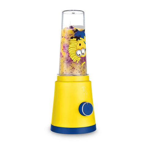 Product image of Smoothie maker. Part of the Minions Collection . Features: • Material: stainless steel, plastic • Power: 320 W • 220-240 V 50/60 Hz • 2 pcs takeaway jar with lid: 300 ml and 600 ml • Color: yellow- blue. (Studio view). Official Berlinger Haus product, boosted by Promintra sl.