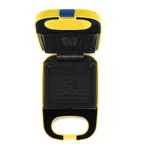 Product image of 3in1 sandwich maker with detachable plates. Part of the Minions Collection . Features: • Material: aluminium, plastic • Power: 600 W • Voltage: 220-240 V, 50/60Hz • Plate size: 13,1*12 cm • NON-STICK coating • Size: 14,5*25*9 cm • Len.... (Studio view). Official Berlinger Haus product, boosted by Promintra sl.