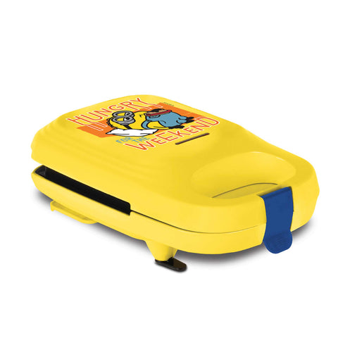 Product image of Sandwich maker. Part of the Minions Collection . Features: • Material: aluminium, plastic • Power: 600 W • Voltage: 220-240 V, 50/60Hz • Plate size: 13,1*12 cm • NON-STICK coating • Size: 14,5*25*9 cm • Len.... (Studio view). Official Berlinger Haus product, boosted by Promintra sl.