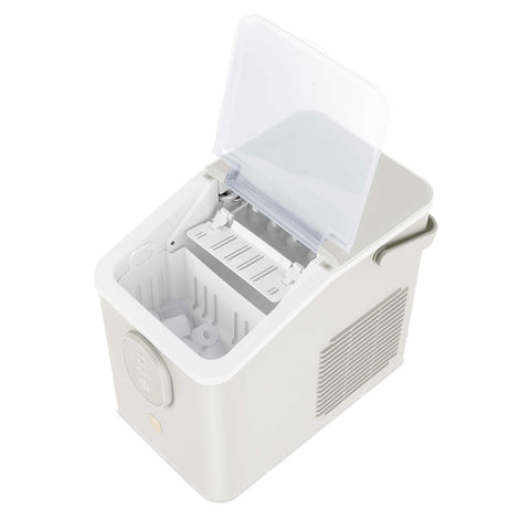 Product image of Ice cube maker. Part of the Sahara Collection . Features: • Power: 120W • Voltage: 220-240V, 50/60Hz • 0,8L water tank • Accessories: • Ice scoop • Ice basket • Length of power cord: 1,2 m • Color: cream. (Studio view). Official Berlinger Haus product, boosted by Promintra sl.