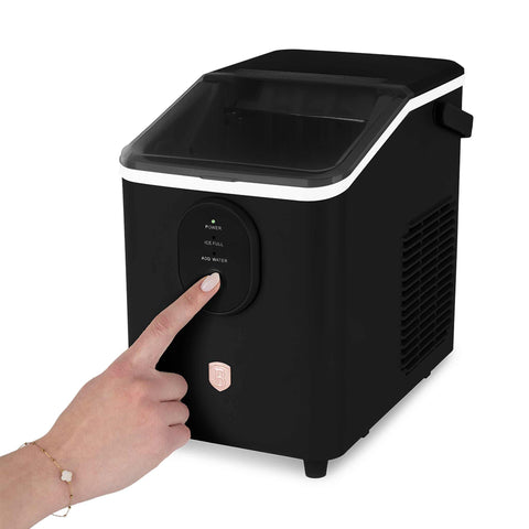 Product image of Ice cube maker. Part of the Black Rose Collection . Features: • Power: 120W • Voltage: 220-240V, 50/60Hz • 0,8L water tank • Accessories: • Ice scoop • Ice basket • Length of power cord: 1,2 m • Color: black- .... (Studio view). Official Berlinger Haus product, boosted by Promintra sl.