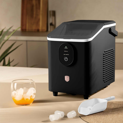 Product image of Ice cube maker. Part of the Black Rose Collection . Features: • Power: 120W • Voltage: 220-240V, 50/60Hz • 0,8L water tank • Accessories: • Ice scoop • Ice basket • Length of power cord: 1,2 m • Color: black- .... (Studio view). Official Berlinger Haus product, boosted by Promintra sl.