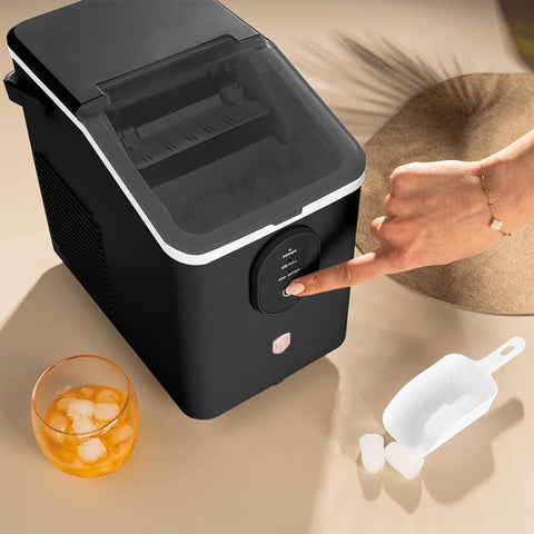 Product image of Ice cube maker. Part of the Black Rose Collection . Features: • Power: 120W • Voltage: 220-240V, 50/60Hz • 0,8L water tank • Accessories: • Ice scoop • Ice basket • Length of power cord: 1,2 m • Color: black- .... (Studio view). Official Berlinger Haus product, boosted by Promintra sl.