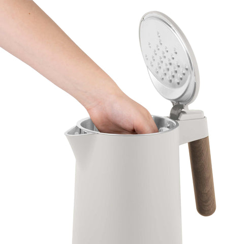 Product image of Double wall kettle. Part of the Sahara Nordic Collection . Features: • Material: stainless steel inside, plastic outside • Capacity: 1,7L • Voltage: 220-240V,50/60Hz • Power: 2200 W • Size: 23*16*25 cm • Length of po.... (Studio view). Official Berlinger Haus product, boosted by Promintra sl.