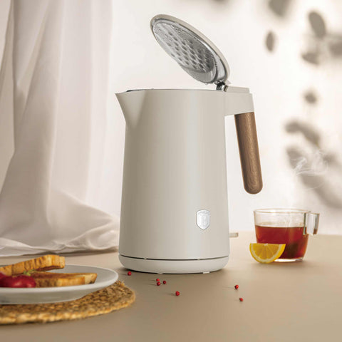 Product image of Double wall kettle. Part of the Sahara Nordic Collection . Features: • Material: stainless steel inside, plastic outside • Capacity: 1,7L • Voltage: 220-240V,50/60Hz • Power: 2200 W • Size: 23*16*25 cm • Length of po.... (Studio view). Official Berlinger Haus product, boosted by Promintra sl.