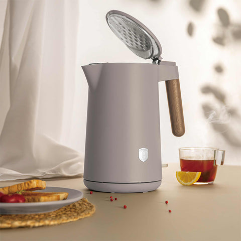 Product image of Double wall kettle. Part of the Taupe Nordic Collection . Features: • Material: 18/10 stainless steel inside, plastic outside • Capacity: 1,7L • Voltage: 220-240V, 50/60Hz • Power: 2200 W • Size: 23*16*25 cm • Lengt.... (Studio view). Official Berlinger Haus product, boosted by Promintra sl.