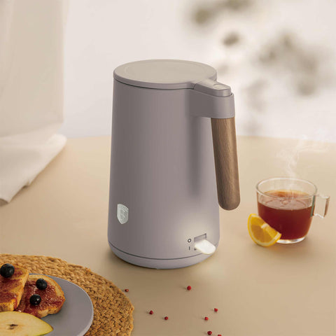 Product image of Double wall kettle. Part of the Taupe Nordic Collection . Features: • Material: 18/10 stainless steel inside, plastic outside • Capacity: 1,7L • Voltage: 220-240V, 50/60Hz • Power: 2200 W • Size: 23*16*25 cm • Lengt.... (Studio view). Official Berlinger Haus product, boosted by Promintra sl.