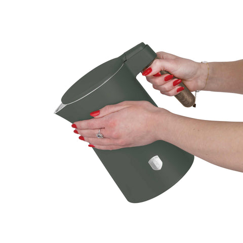 Product image of Double wall kettle. Part of the Matte Green Collection . Features: • Material: 18/10 stainless steel inside, plastic outside • Capacity: 1,7L • Voltage: 220-240V, 50/60Hz • Power: 2200 W • Size: 23*16*25 cm • Lengt.... (Studio view). Official Berlinger Haus product, boosted by Promintra sl.