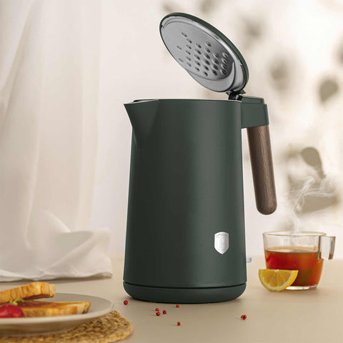 Product image of Double wall kettle. Part of the Matte Green Collection . Features: • Material: 18/10 stainless steel inside, plastic outside • Capacity: 1,7L • Voltage: 220-240V, 50/60Hz • Power: 2200 W • Size: 23*16*25 cm • Lengt.... (Studio view). Official Berlinger Haus product, boosted by Promintra sl.