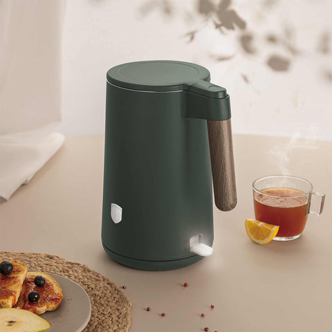 Product image of Double wall kettle. Part of the Matte Green Collection . Features: • Material: 18/10 stainless steel inside, plastic outside • Capacity: 1,7L • Voltage: 220-240V, 50/60Hz • Power: 2200 W • Size: 23*16*25 cm • Lengt.... (Studio view). Official Berlinger Haus product, boosted by Promintra sl.