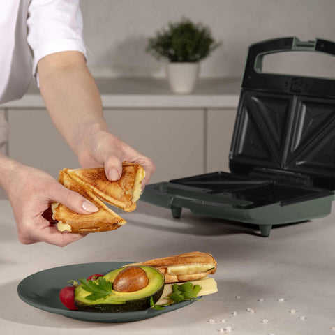 Product image of 3in1 sandwich maker with detachable plates and glass panel. Part of the Matte Green Collection . Features: • Material: aluminium, glass, plastic • Power: 800 W • Voltage: 220-240 V, 50/60Hz • Plate size: 21,6*12 cm • NON-STICK coating • Length of power c.... (Studio view). Official Berlinger Haus product, boosted by Promintra sl.