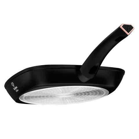 Product image of Grill pan 28cm. Part of the MATTE BLACK- ROSE GOLD . Features: • Material: forged aluminum with non-stick titanPro coating • Grill pan Ø28*4,1 cm 2,1L • Color: matt black- rose gold. (Studio view). Official Berlinger Haus product, boosted by Promintra sl.