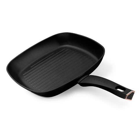 Product image of Grill pan 28cm. Part of the MATTE BLACK- ROSE GOLD . Features: • Material: forged aluminum with non-stick titanPro coating • Grill pan Ø28*4,1 cm 2,1L • Color: matt black- rose gold. (Studio view). Official Berlinger Haus product, boosted by Promintra sl.