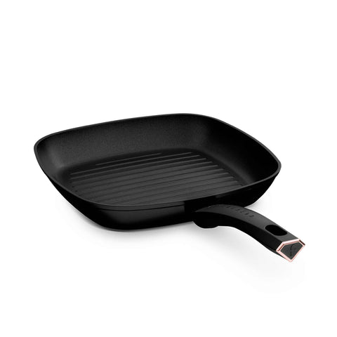 Product image of Grill pan 28cm. Part of the MATTE BLACK- ROSE GOLD . Features: • Material: forged aluminum with non-stick titanPro coating • Grill pan Ø28*4,1 cm 2,1L • Color: matt black- rose gold. (Studio view). Official Berlinger Haus product, boosted by Promintra sl.